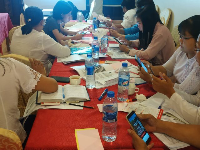 Myanmar MRC staff testing SaverAsia at FinLit training
