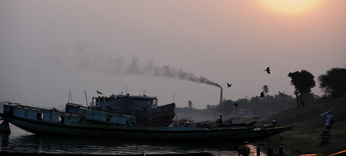 Countries must urgently transition away from fossil fuels. Pictured here, black smoke smoke rises from a chimney at a brick kiln, which uses coal fire to bake bricks, in eastern Bangladesh. (file photo)