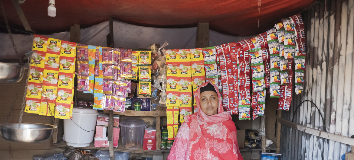 Sada, a livestock trader in her shop in the Digaale displaced persons camp in Hargeisa, Somalia.