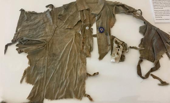 A shirt shredded in the nuclear bombing was an artifact in the disarmament exhibition. 