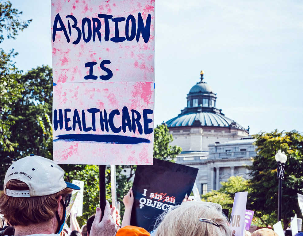 Protesters demonstrate against US Supreme Court decision to criminalize a women's right to abortion.