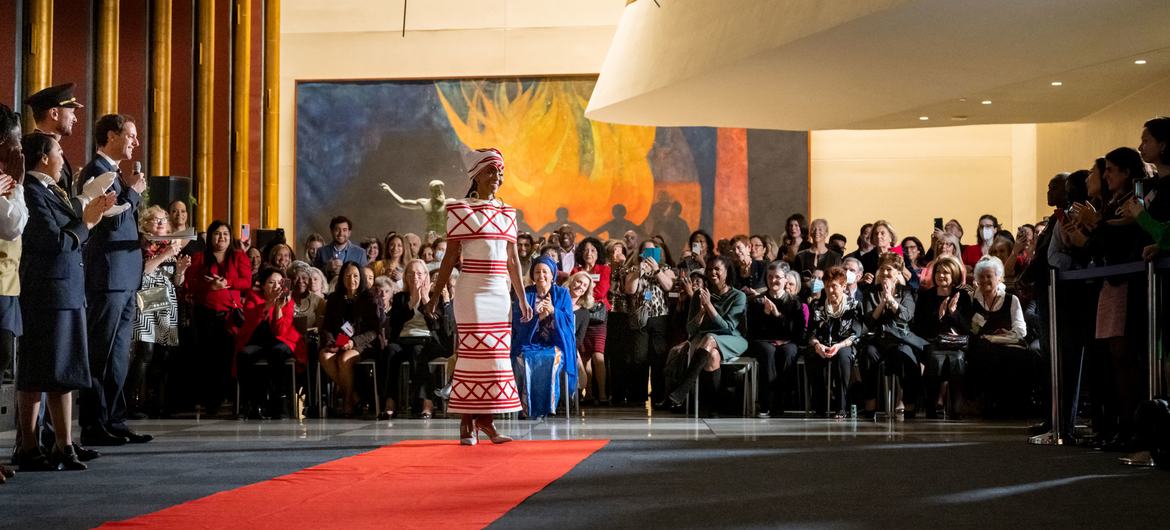 The UN Guided Tours unit celebrates its 70th anniversary with a fashion show of different uniforms worn over seven decades, as well as traditional outfits showcasing the diverse nationalities and backgrounds.