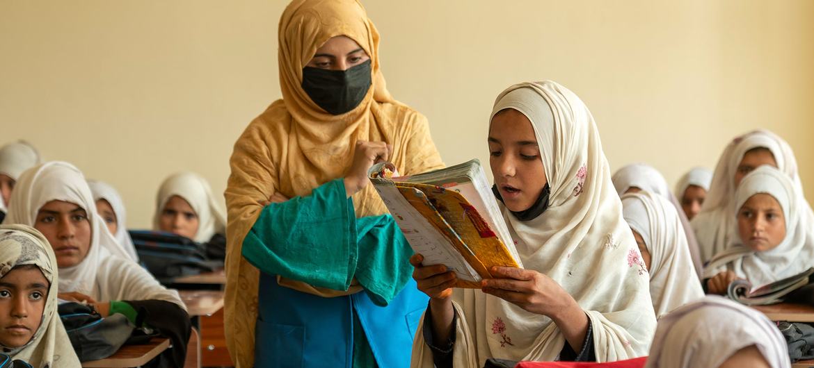 A female Afghan volunteer engaged in a UNHCR-supported education project in Jalalabad, Afghanistan. 