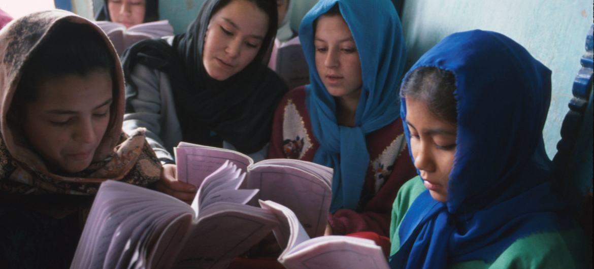 Girls reading textbooks at the Dasht-e-Barchi Education Centre in Kabul, Afghanistan. (file)