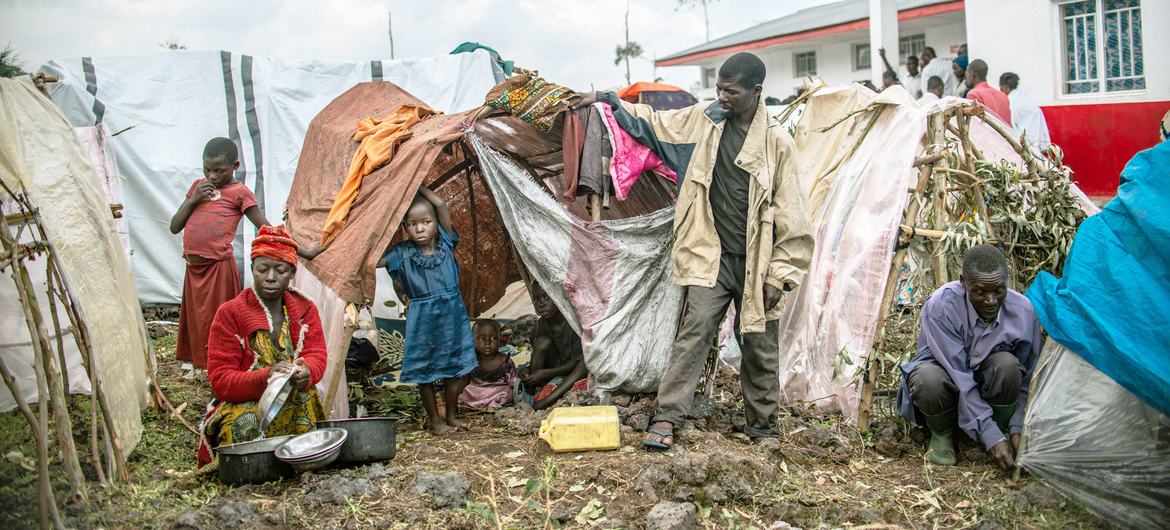 Nyiranzaba and her nine children take refuge in a tent after fleeing her village in Rutshuru territory, North Kivu province, DR Congo.