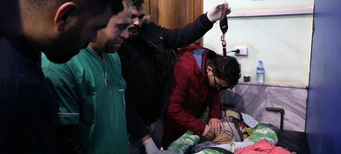 A victim of the February 6 earthquake is treated in Samada, Syria.